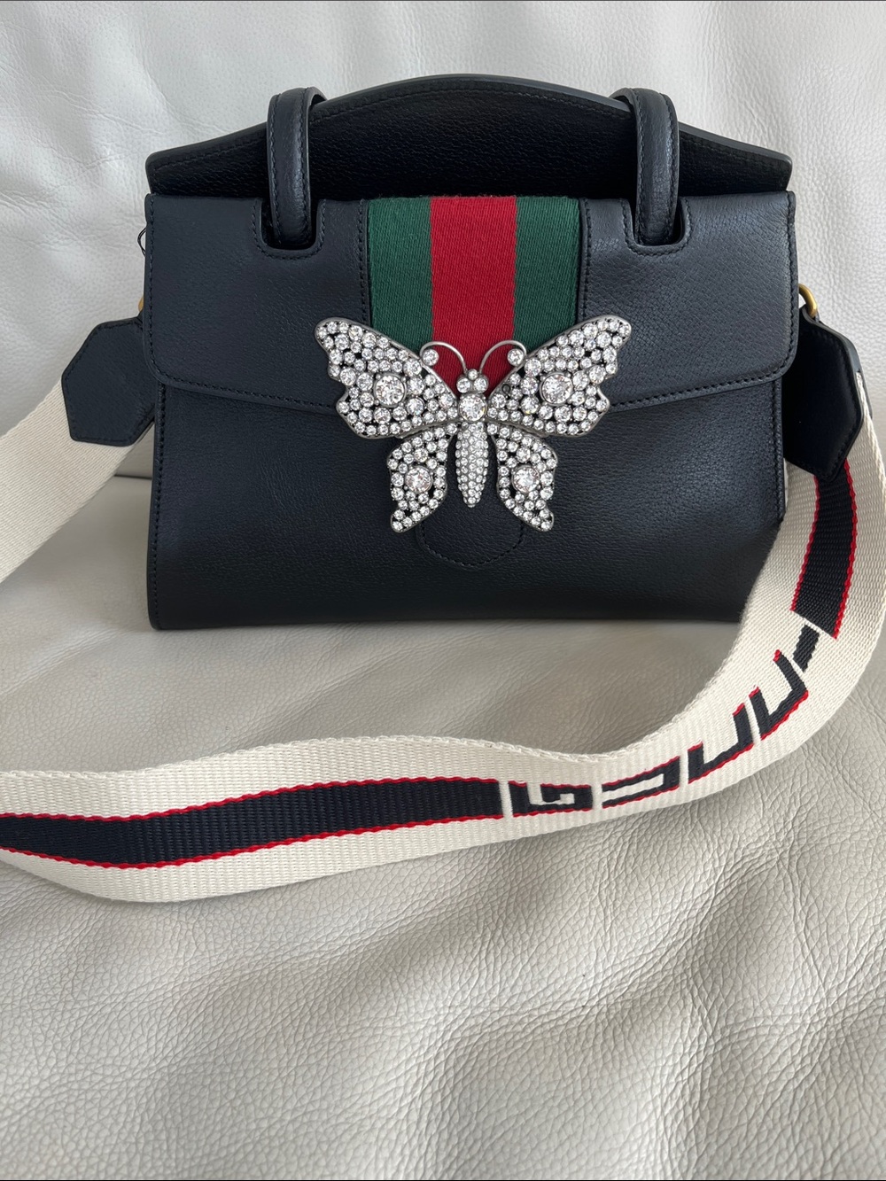 Gucci Black Leather Top-Handle Bag with Crystal Butterfly Accent